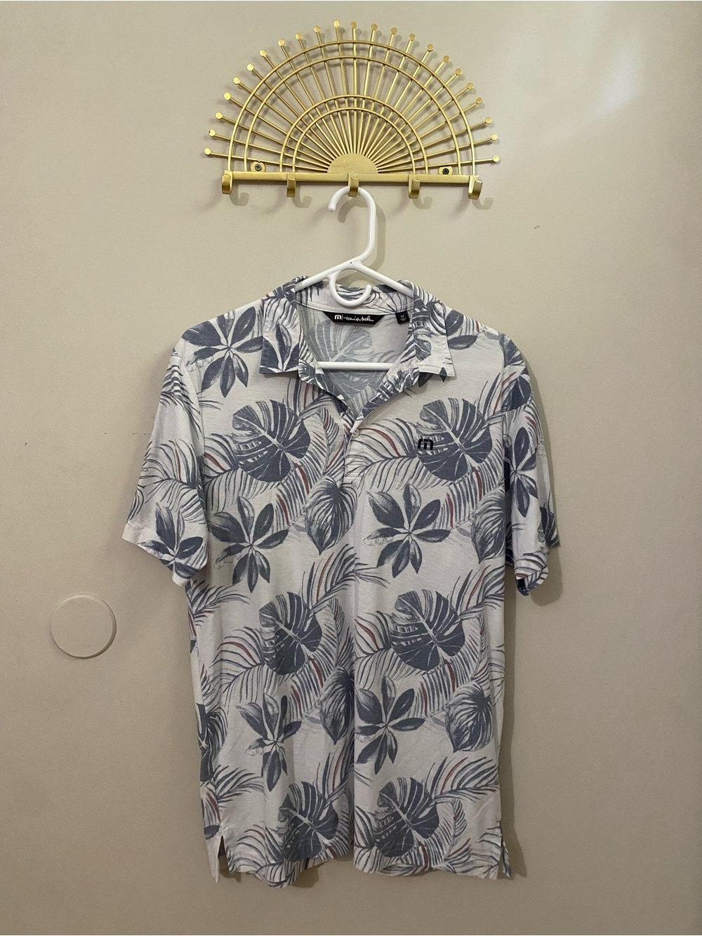TravisMathew White Polo with Blue Tropical Leaf Print
